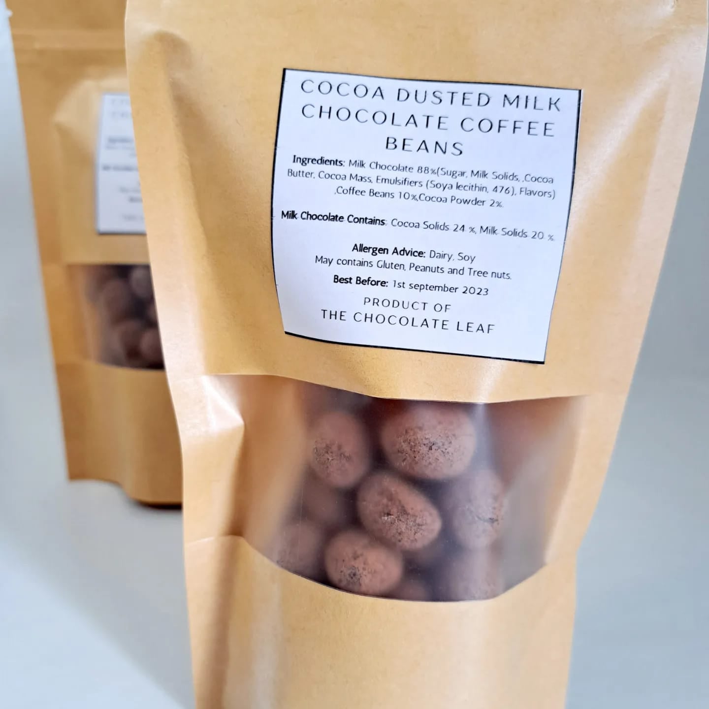 Cocoa Dusted Milk Chocolate Coffee Beans - The Chocolate Leaf